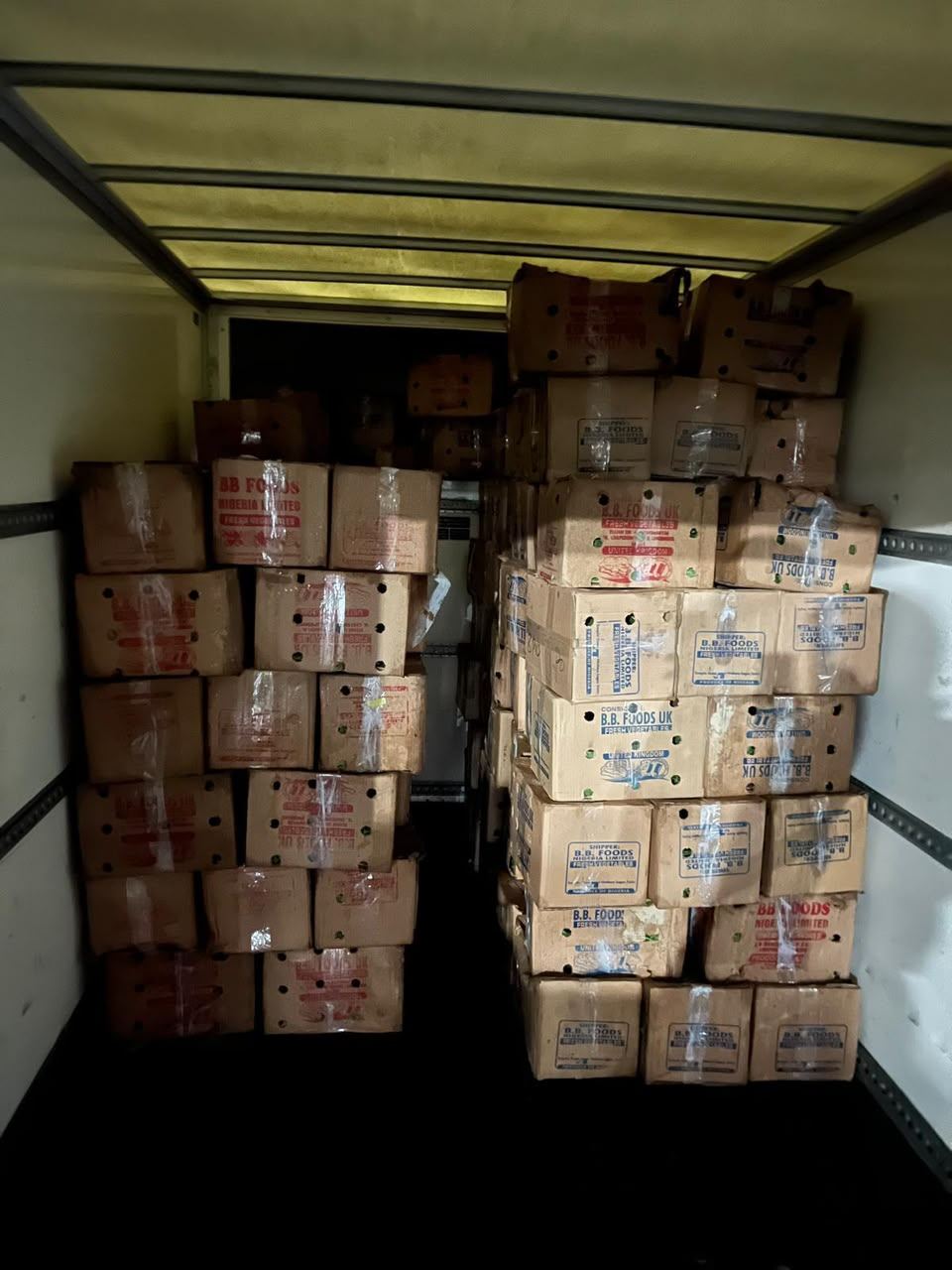 Van loaded with palletised fresh produce boxes