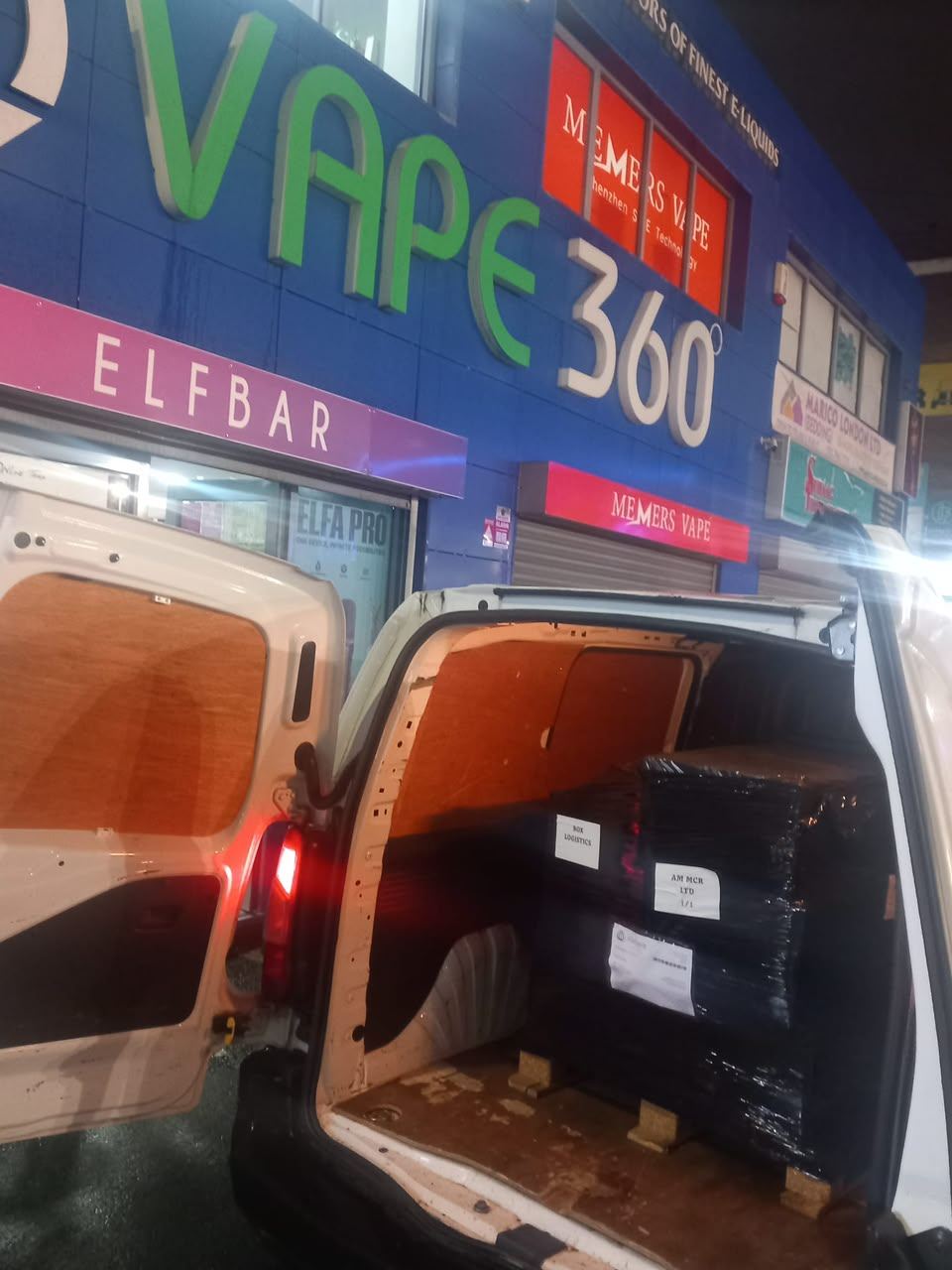 Doosan forklift loading a wrapped pallet into a van