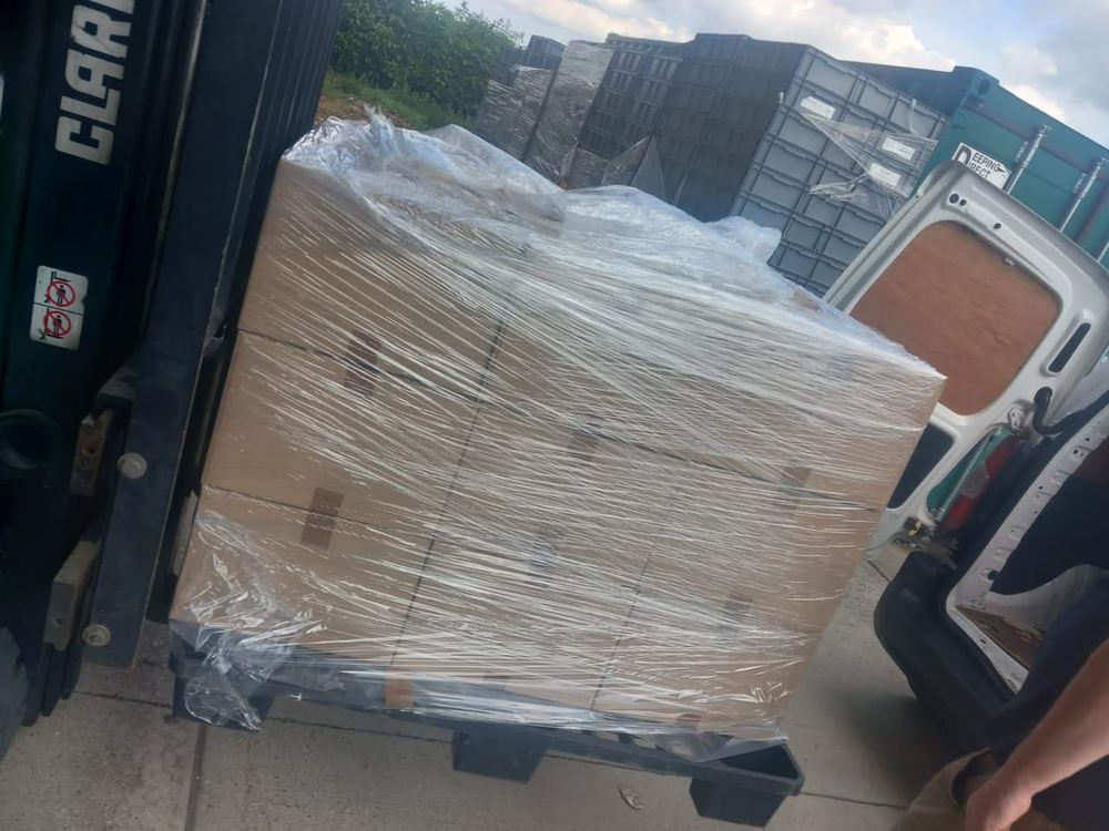 Crated air-freight consignment labelled dangerous goods UN3363